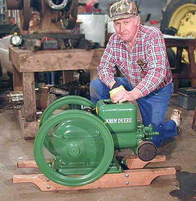 Photo of Larry with 1928 1.5 HP John Deere Model E